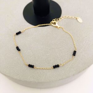 Seville Jewelry forgyldt sølv armbånd med sorte facetterede sten, 16 + 3 cm.