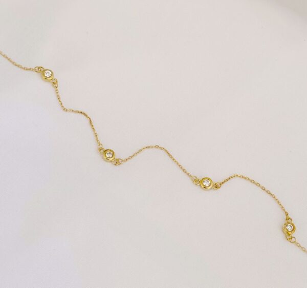 Guld & Sølv Design 8kt guld armbånd med zirkonia 9248/08