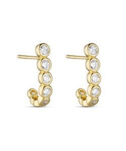 Forgyldte ørestikker i 925 sterling sølv med otte klare zirkonia i rørfatning. Længde 1,4 cm.