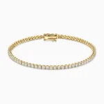 Tennisarmbånd i 14 kt guld med lab‑grown diamanter.